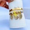 Gold bangle set with multiple stackable bangles for women’s fashion jewelry