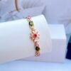 Natural multi tourmaline floral bracelet with colorful gemstones arranged in an elegant flower design"