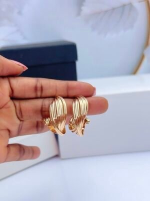 Twisted gold earrings with polished finish and modern spiral design for women