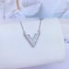 Minimalist V-shaped sterling silver necklace with geometric pendant design